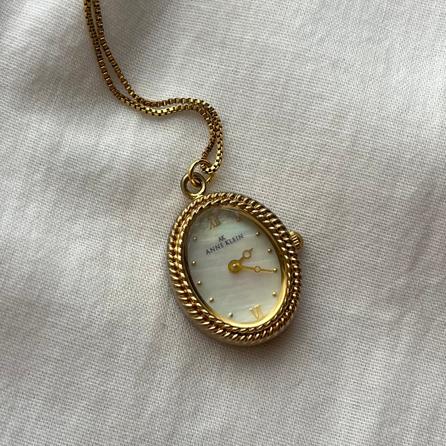 relógio pingente anne klein