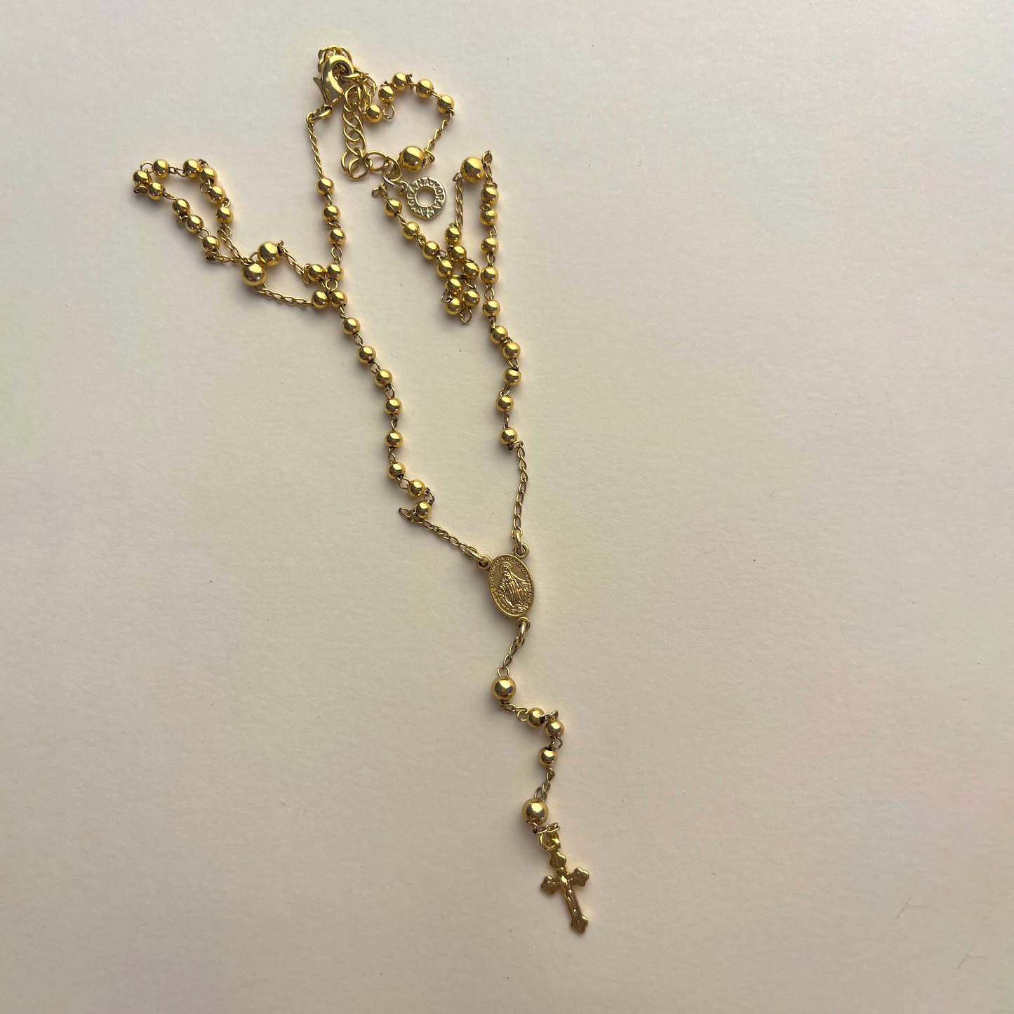 terço dourado