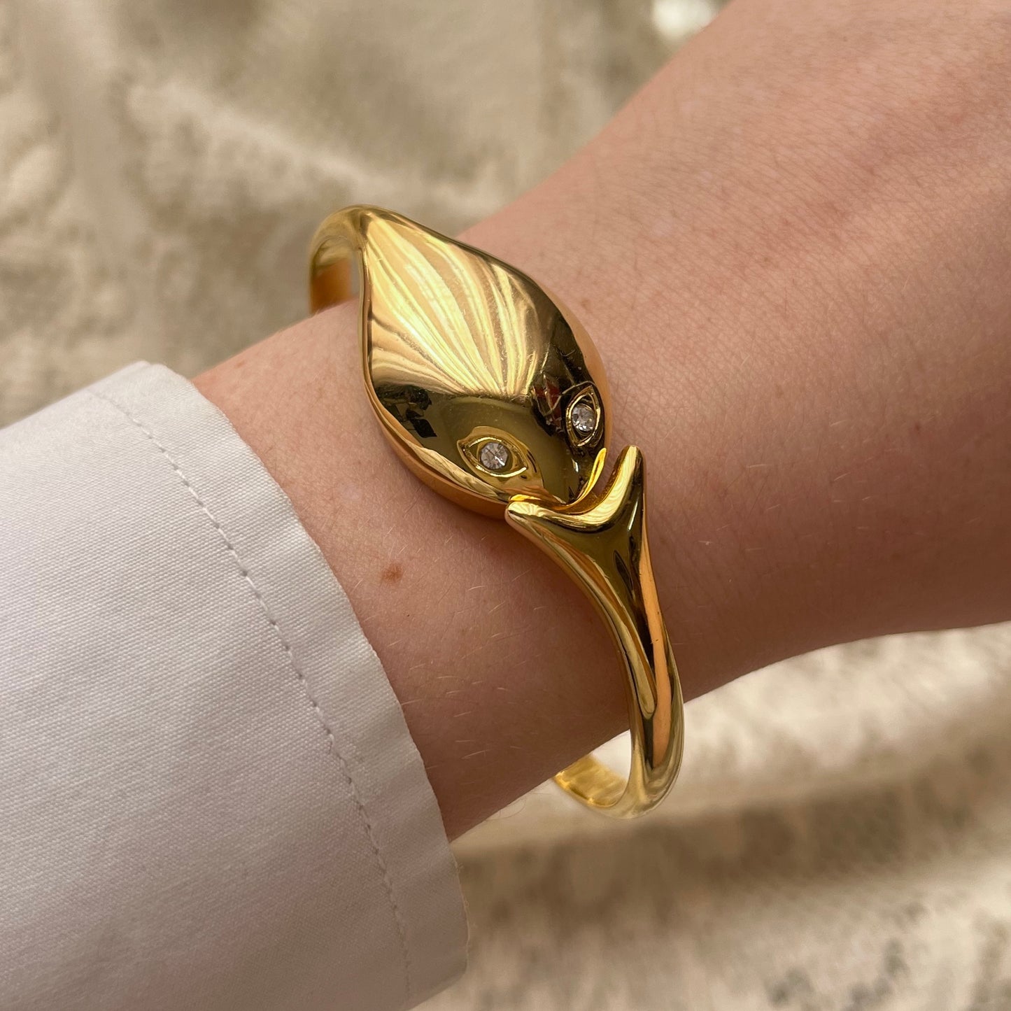 relógio serpente dourado