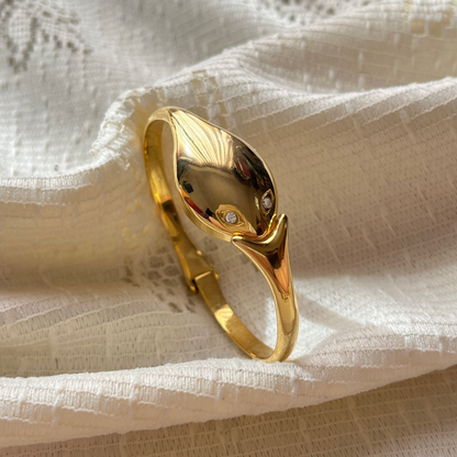 relógio serpente dourado