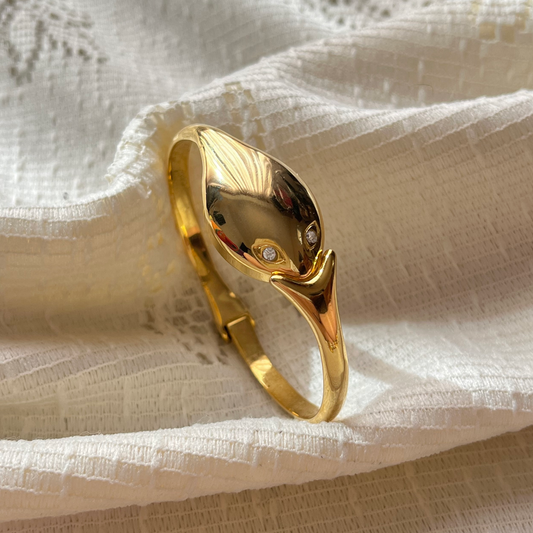 relógio serpente dourado