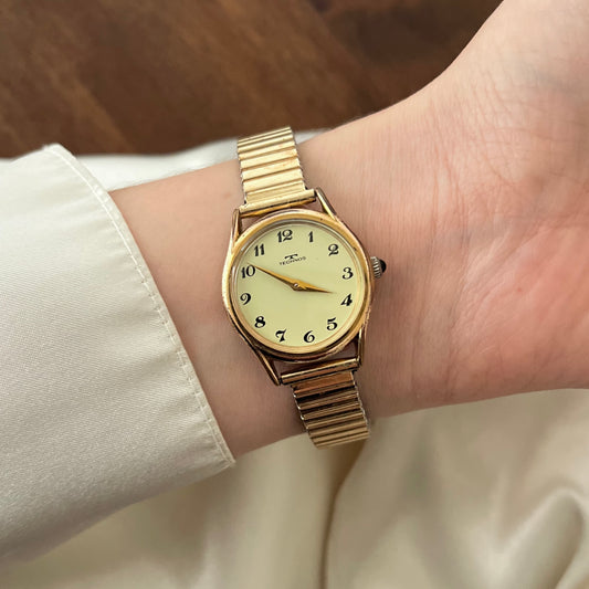 relógio technos dourado