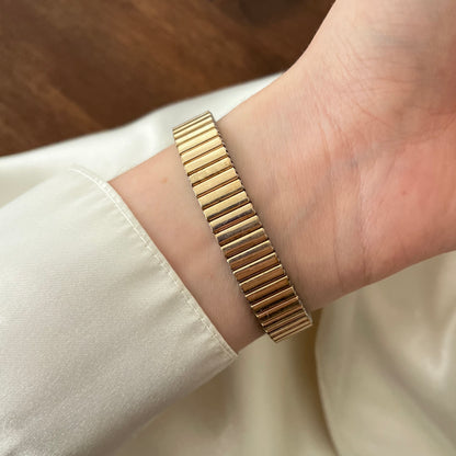 relógio technos dourado