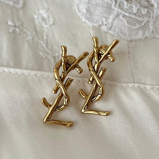 brincos Yves Saint Laurent