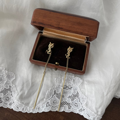 brincos yves saint laurent