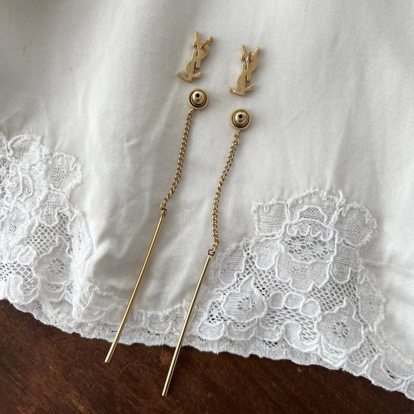 brincos yves saint laurent