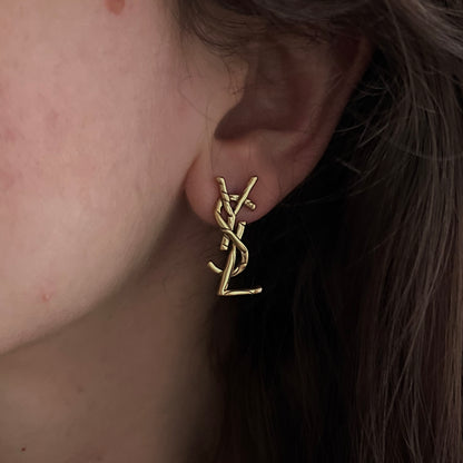 brincos Yves Saint Laurent
