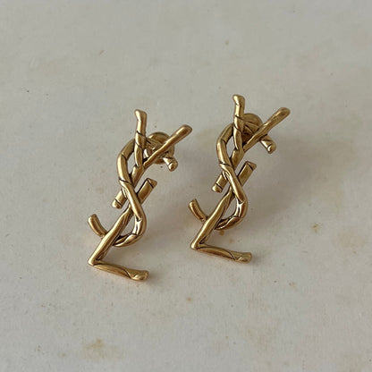 brincos Yves Saint Laurent