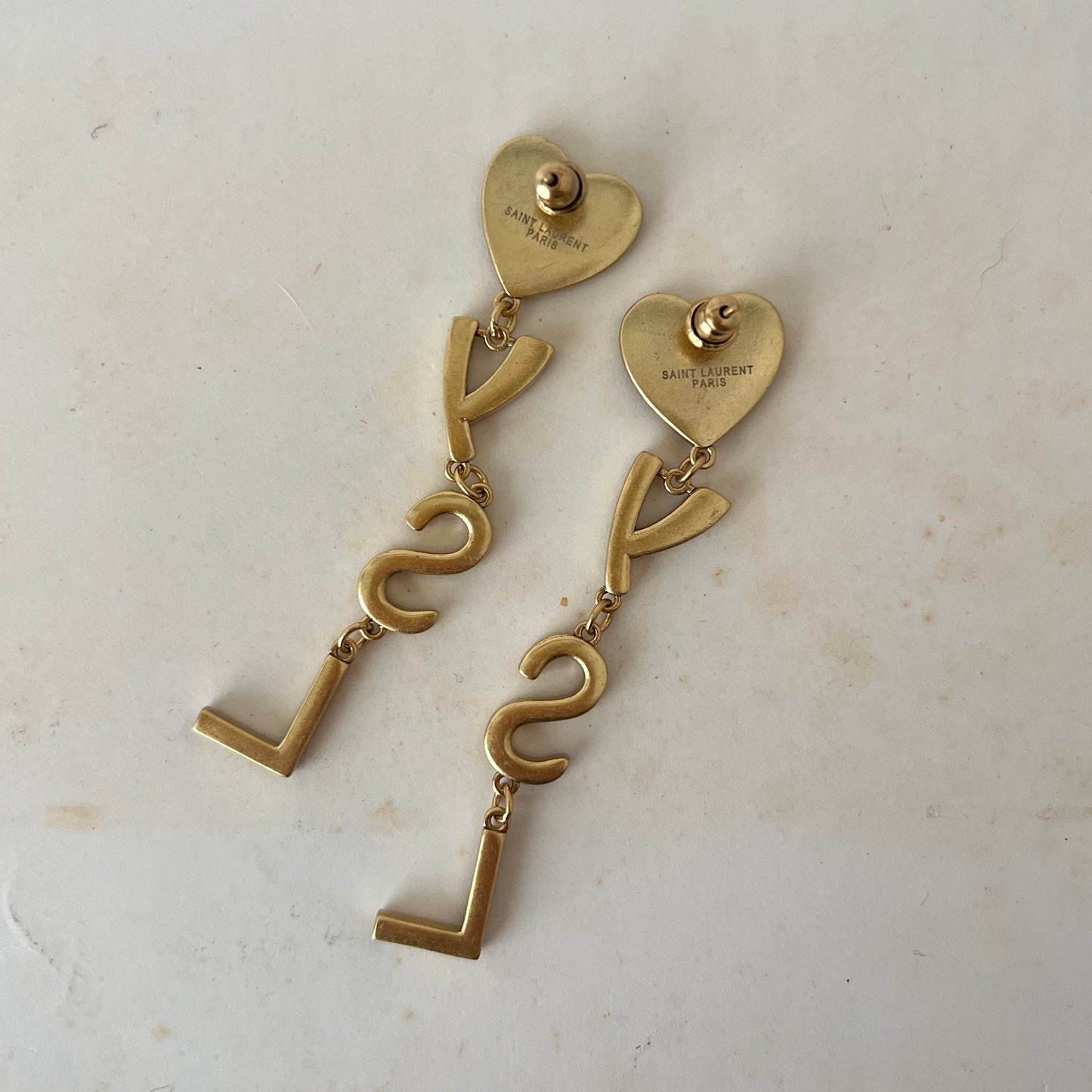 brincos Yves Saint Laurent III