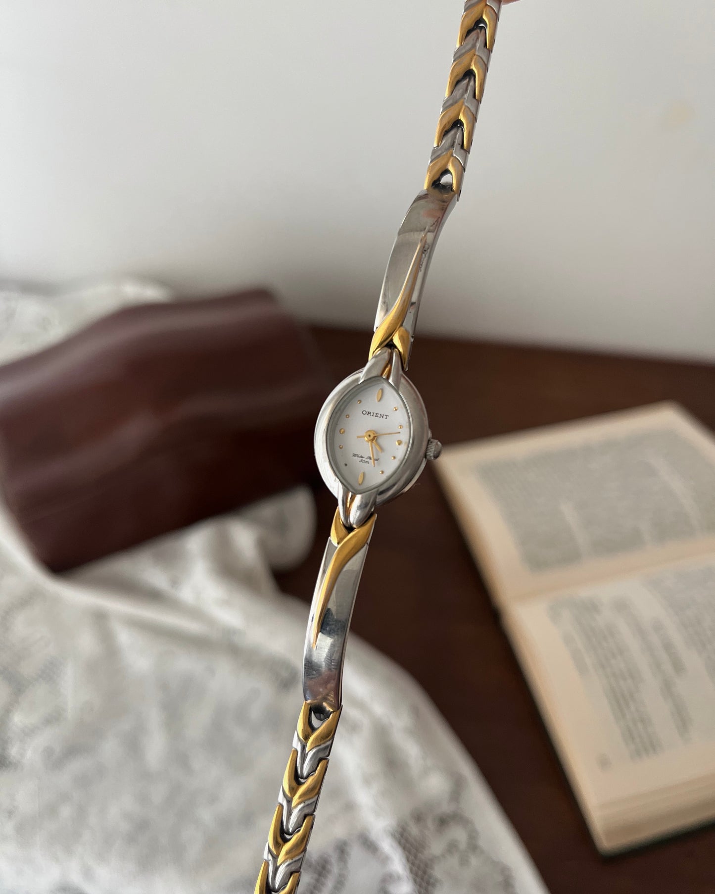 relógio orient dual tone