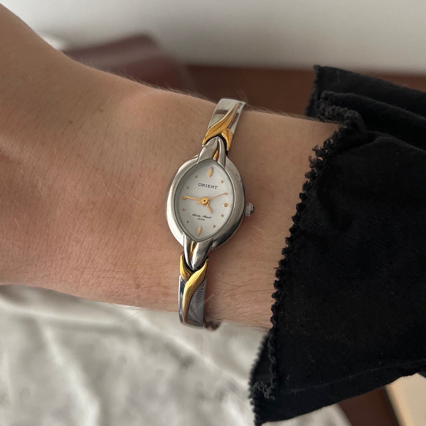 relógio orient dual tone